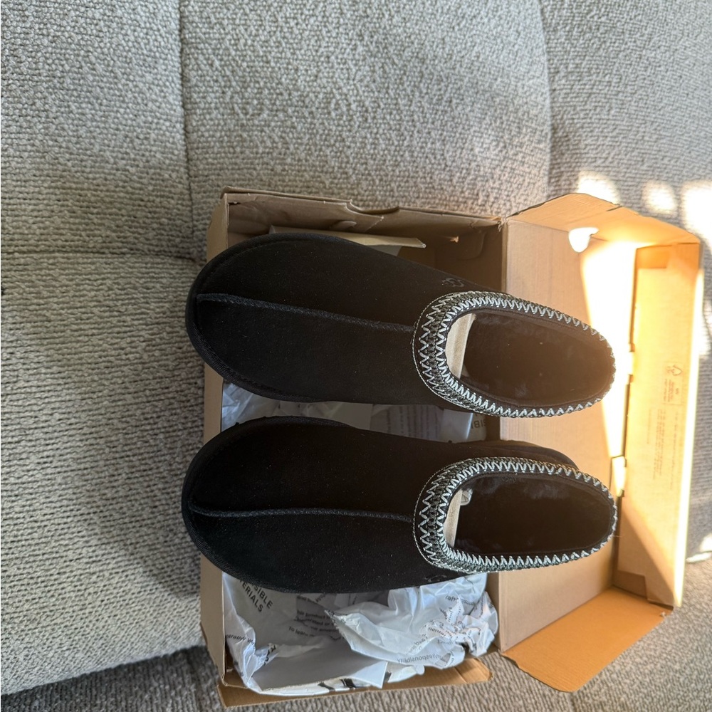 Cozy Black UGG Slippers with White Stitching